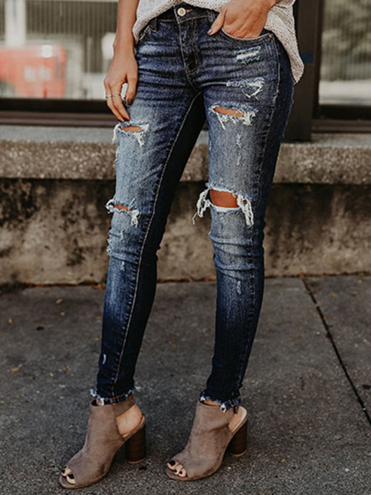 Stretch Ripped Middle Waisted Jeans